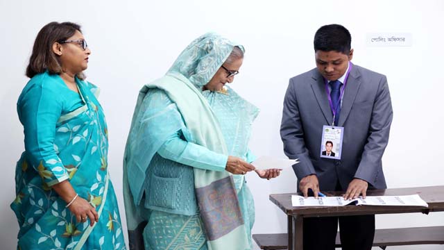 Awami League (AL) president and prime minister Sheikh Hasina speaks to media after she casts her vote in the 12th parliamentary elections at the capital’s Dhaka City College centre on 7 January 2024.